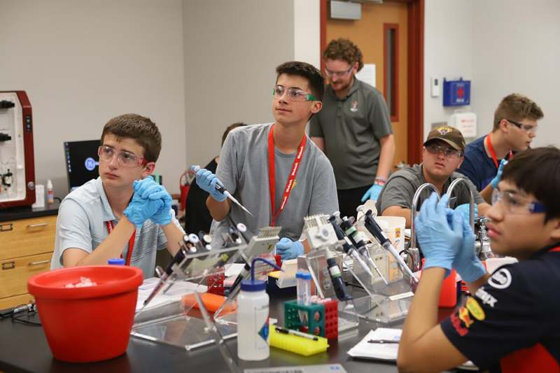 a group of people in a lab