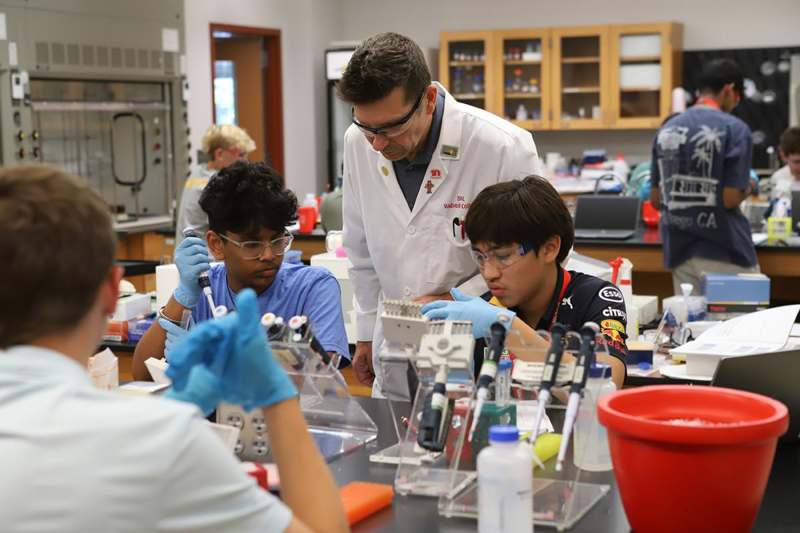 a group of people in a lab