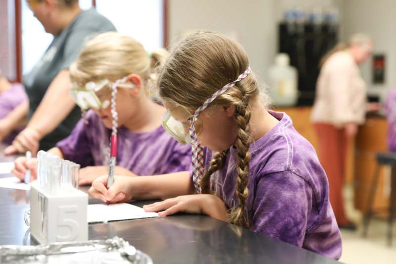 a group of children wearing goggles