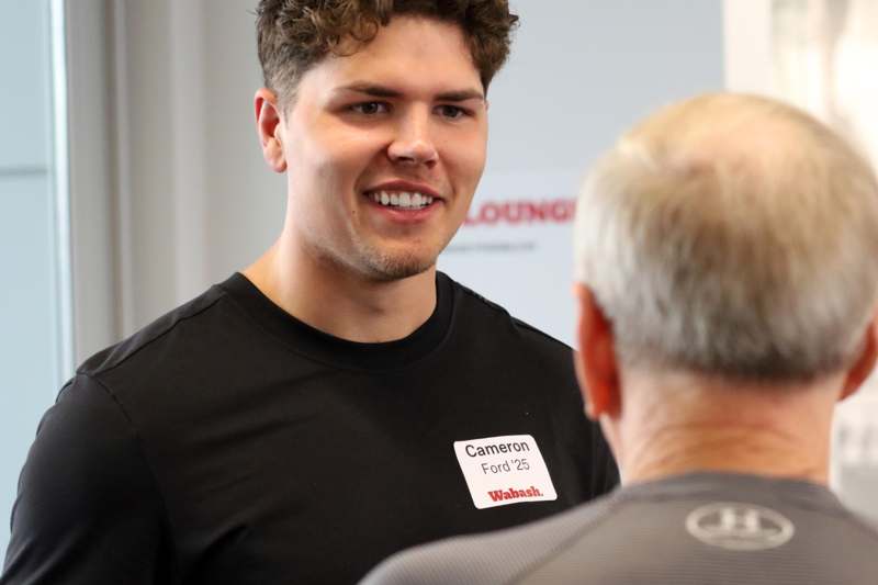 a man talking to another man