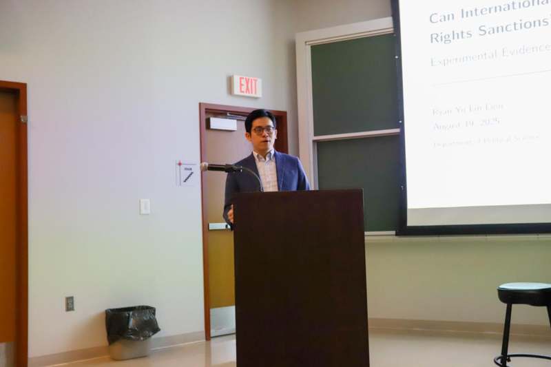 a man standing at a podium