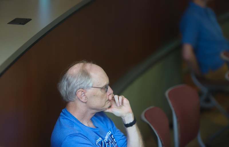 a man in a blue shirt
