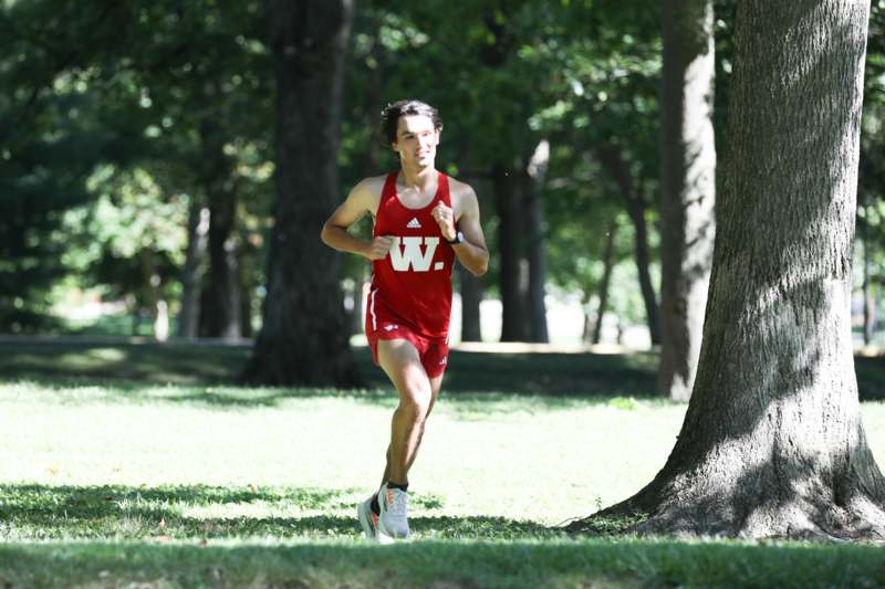 a man running in a park