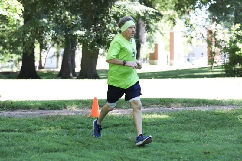 a man running on grass