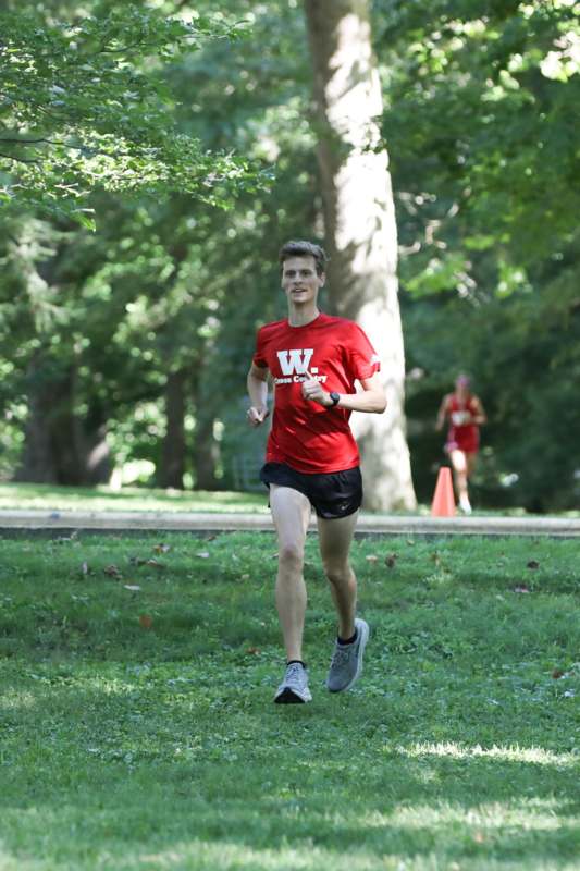a man running in a park