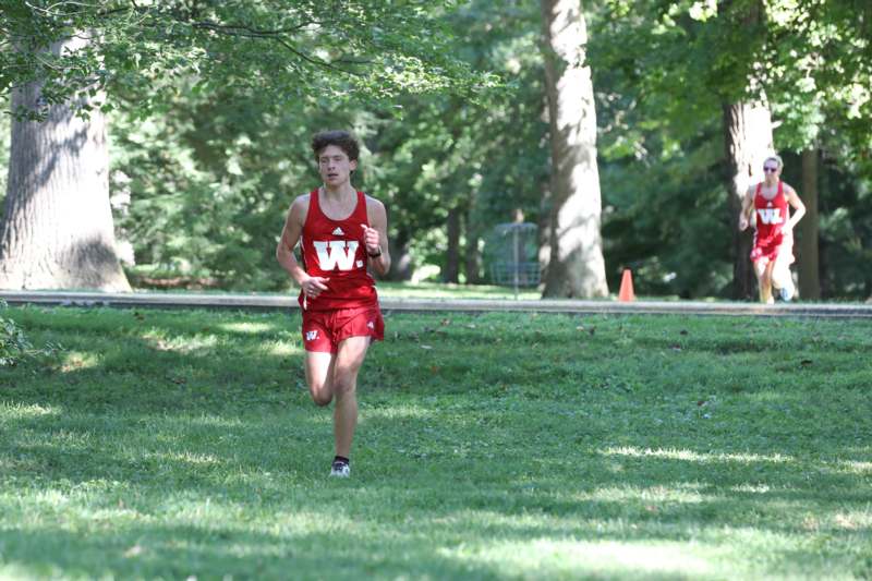 a person running in a park
