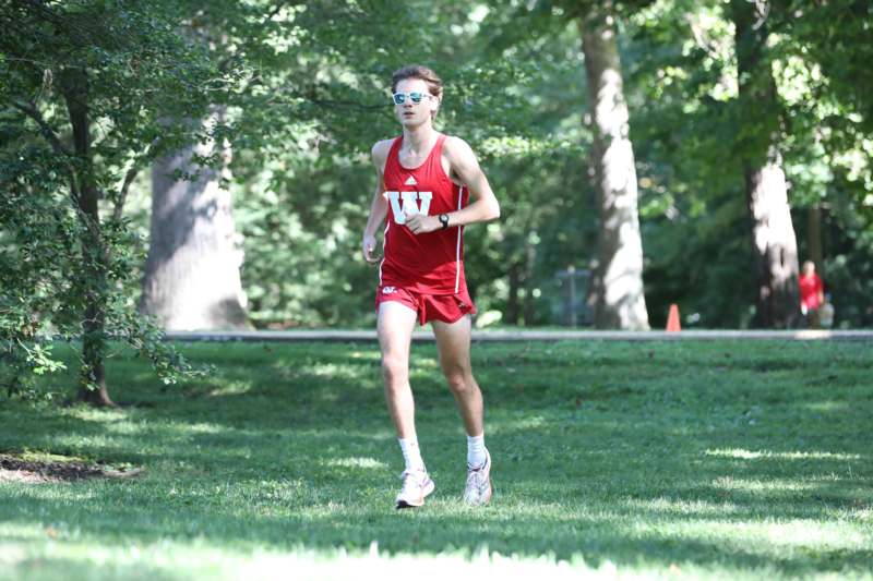 a man running in a park