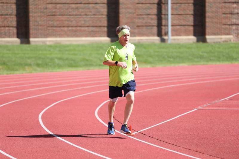 a man running on a track