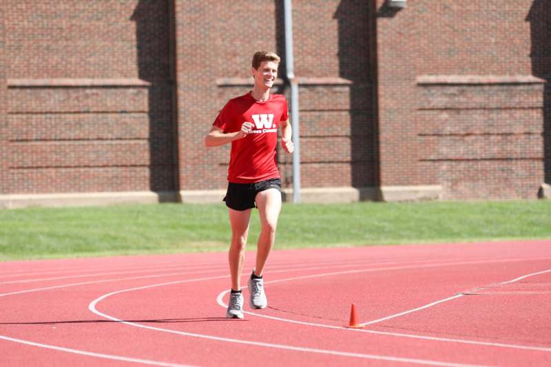 a man running on a track