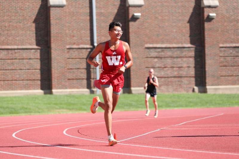 a man running on a track
