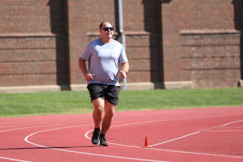 a man running on a track