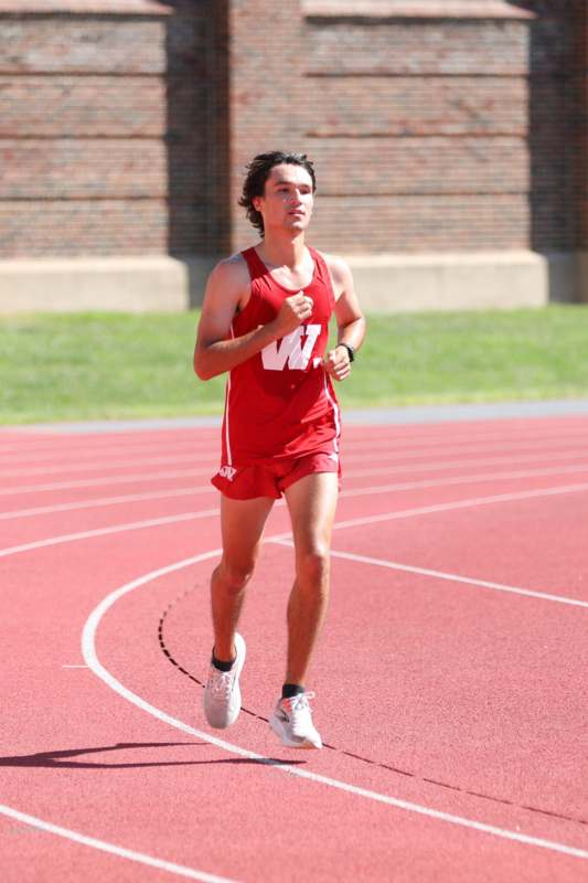 a man running on a track
