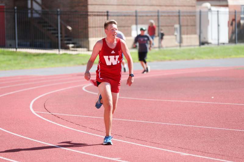 a man running on a track