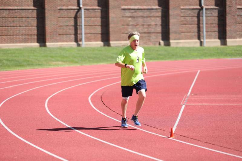 a man running on a track
