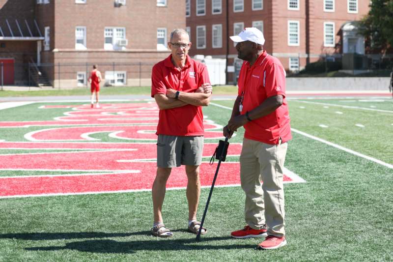 men standing on a football field