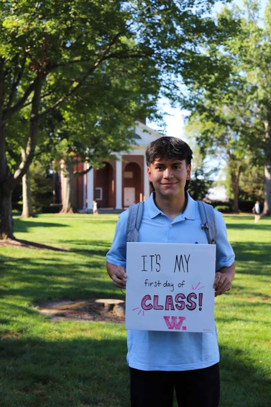 a man holding a sign