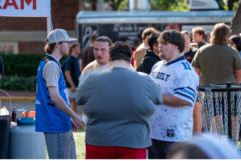 a group of people standing in a circle