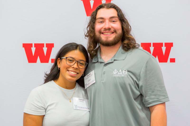 a man and woman standing together