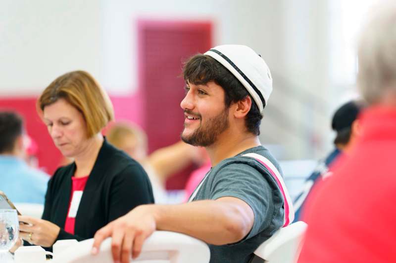 a man in a white hat