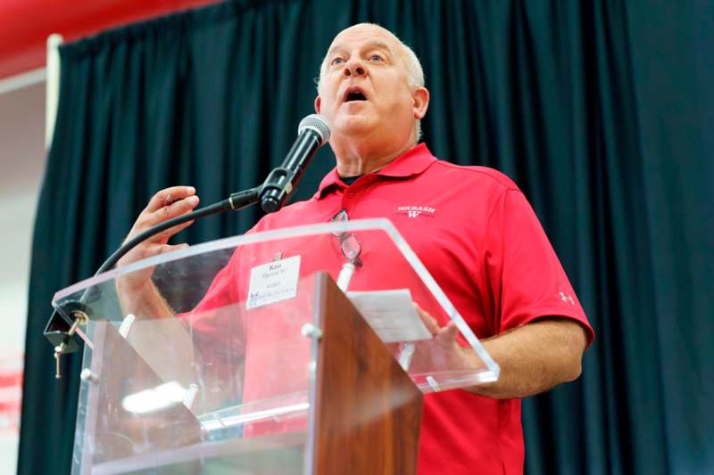 a man speaking into a microphone