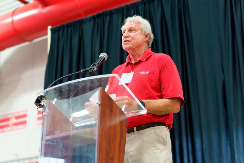 a man standing at a podium