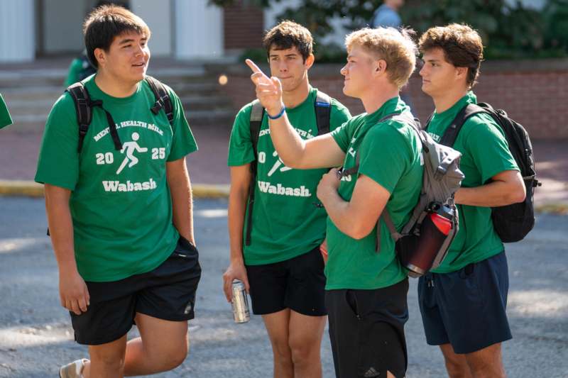 2025 Mental Health Mile - a group of boys wearing green shirts