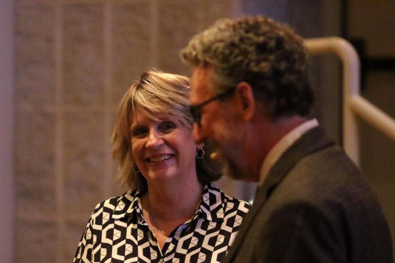 a man and woman smiling