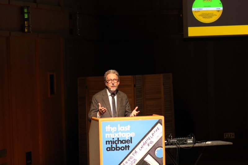 a man standing at a podium