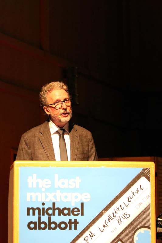 a man standing at a podium