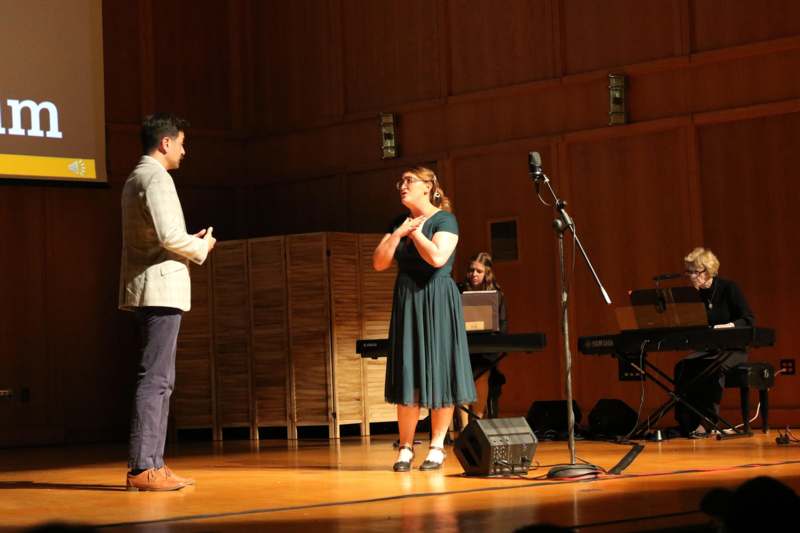 a man and woman on a stage
