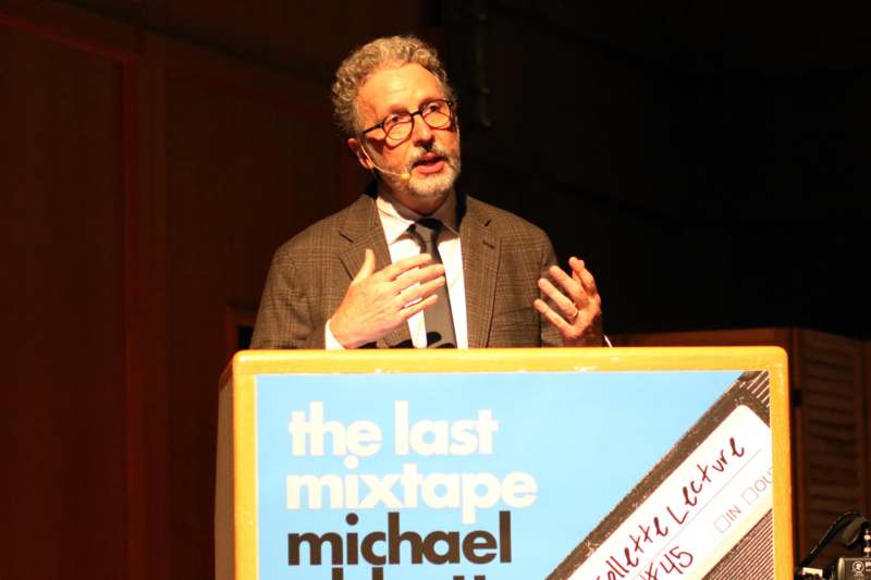 a man standing at a podium