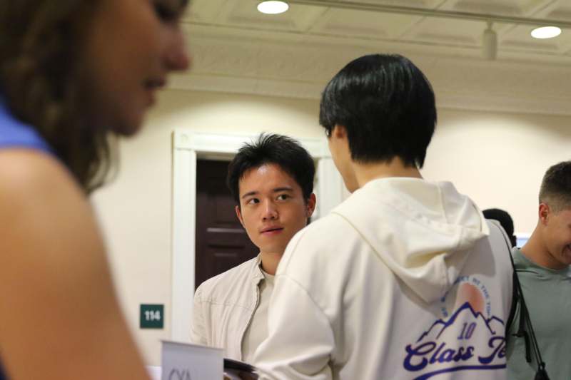 a man looking at another man