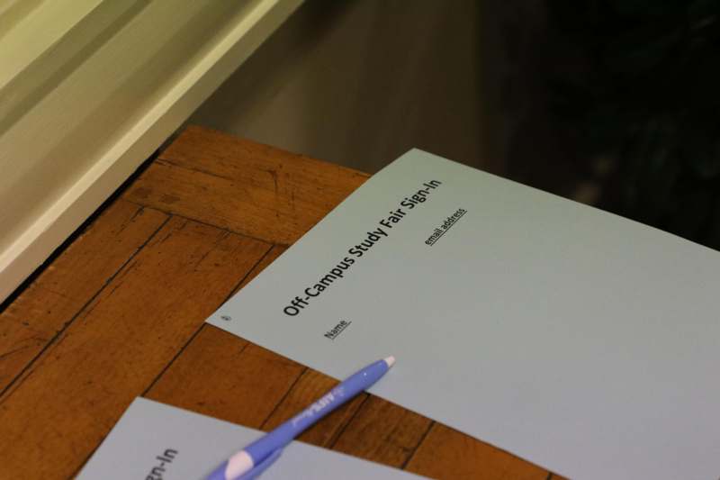 Off-Campus Study Abroad Fair - a pen and paper on a table