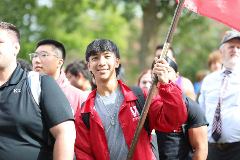 a man holding a flag
