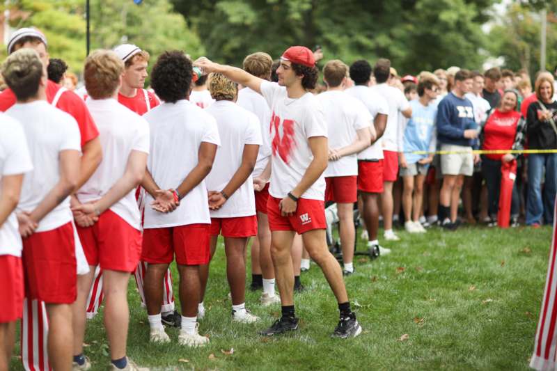 a group of people standing in a line