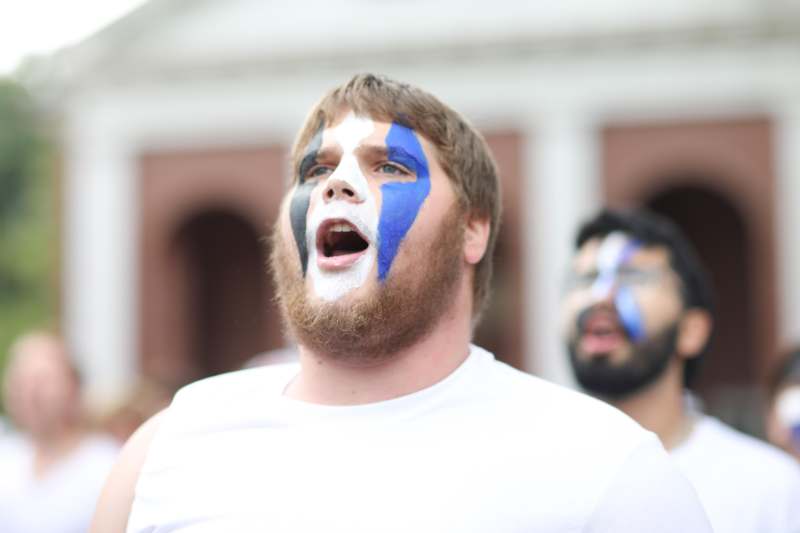 a man with blue and black face paint
