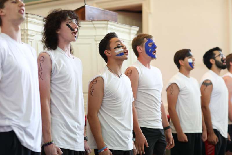 a group of men with face paint