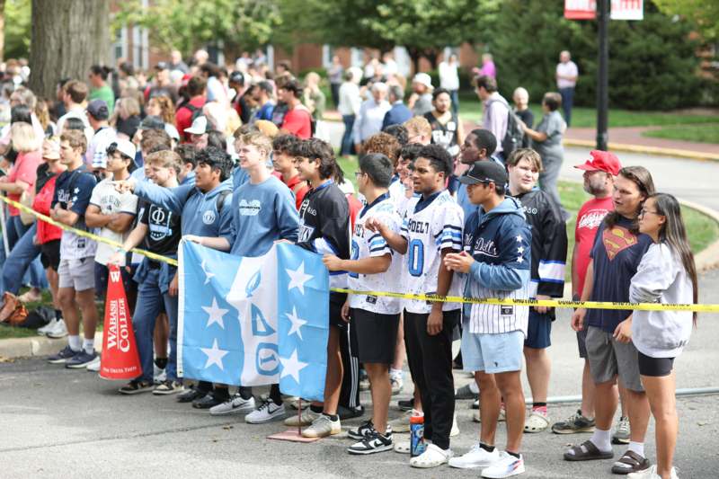 a group of people standing in a line