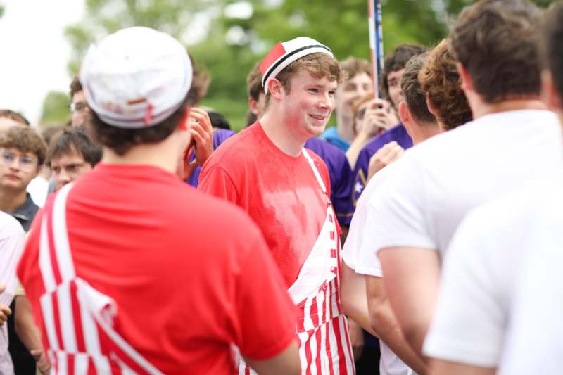 a man in a red and white striped outfit