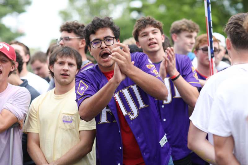a group of people standing in a crowd