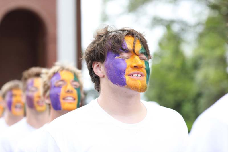 a group of people with face paint