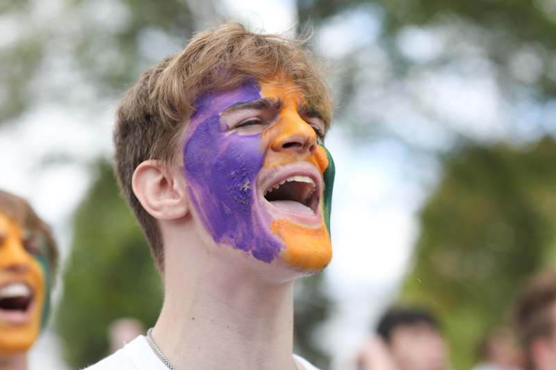 a man with paint on his face
