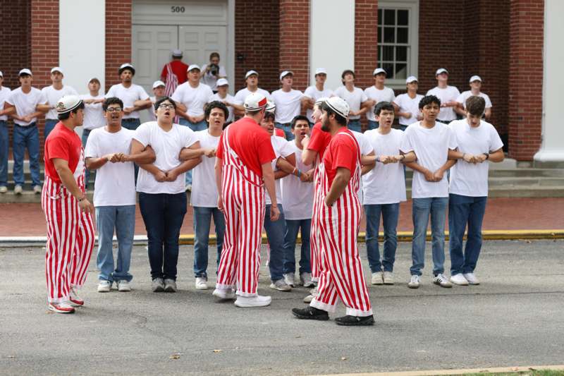 a group of people in matching outfits