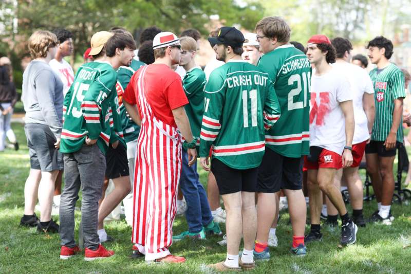 a group of people in sports uniforms