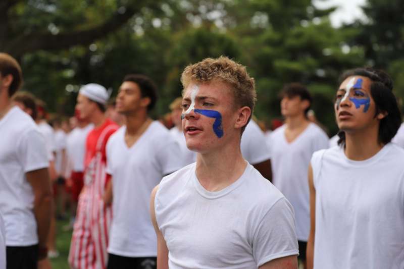 a group of people standing in a line