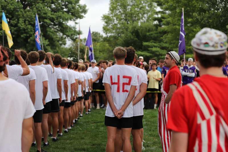 a group of people standing in a line