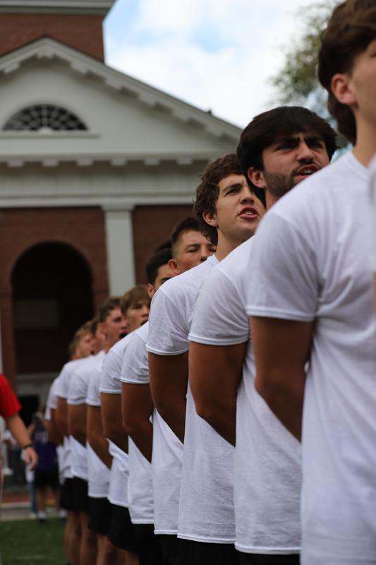 a group of men in a row