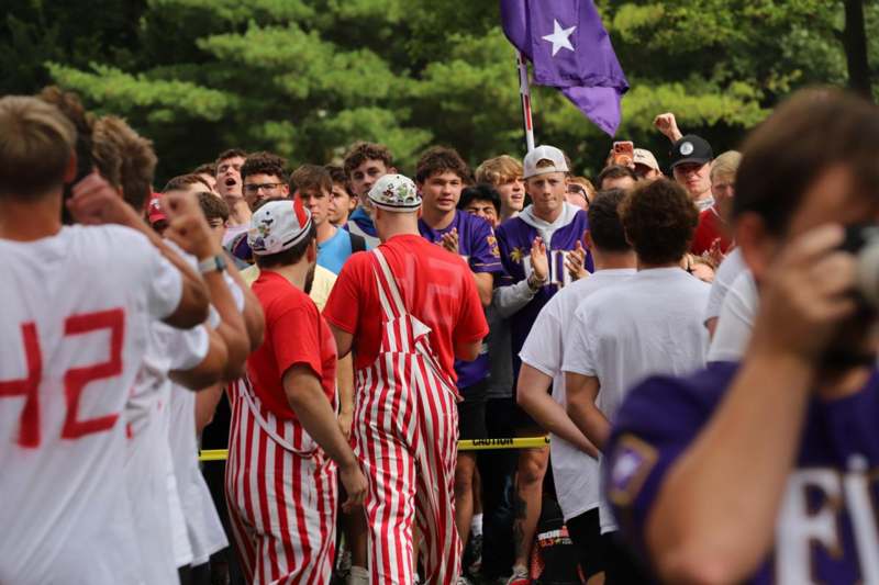a group of people standing in a crowd
