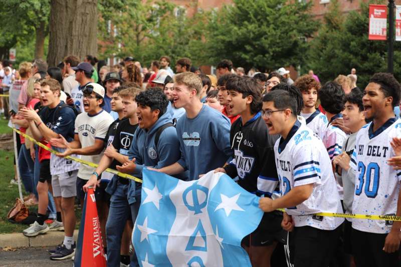 a group of people holding a flag