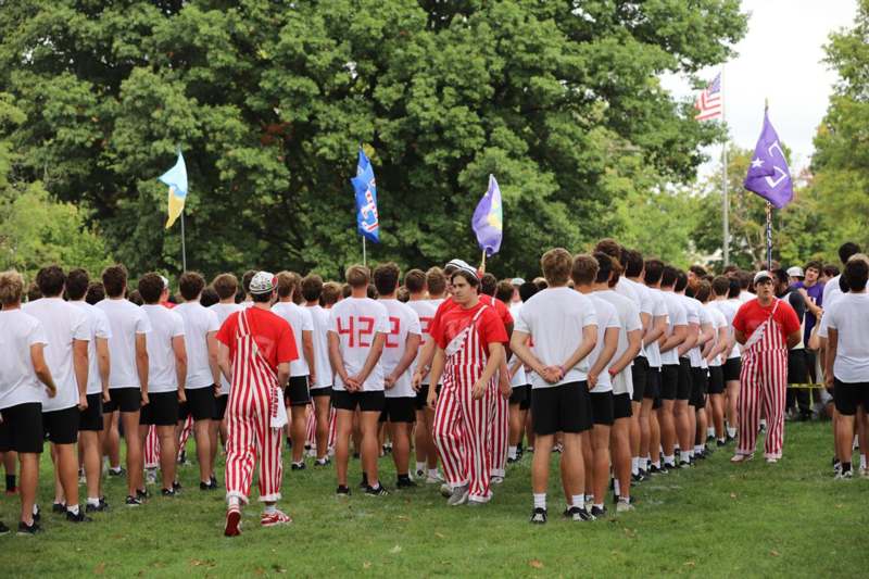 a group of people standing in a line